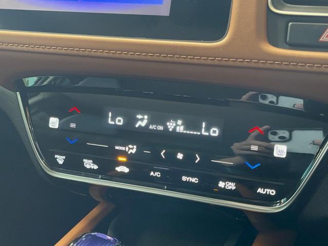 ヴェゼル ハイブリッドＺ・ホンダセンシング　禁煙車　純正ナビ　バックカメラ　レーダークルーズ　ＥＴＣ　シートヒーター　ホンダセンシング　スマートキー　純正革巻きステアリング　純正１７インチアルミ　ＬＥＤヘッドライト　ハーフレザーシート（27枚目）