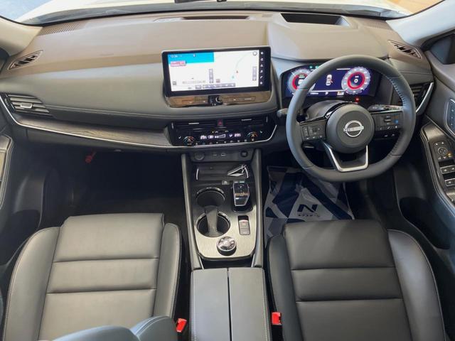 エクストレイル G e-4ORCE 禁煙車 サンルーフ ニッサンコネクト12.3型ディスプレイオーディオ 全周囲カメラ プロパイロット ブラインドスポットモニター シートヒーター 純正革巻きステアリング 純正19インチアルミ(2枚目)