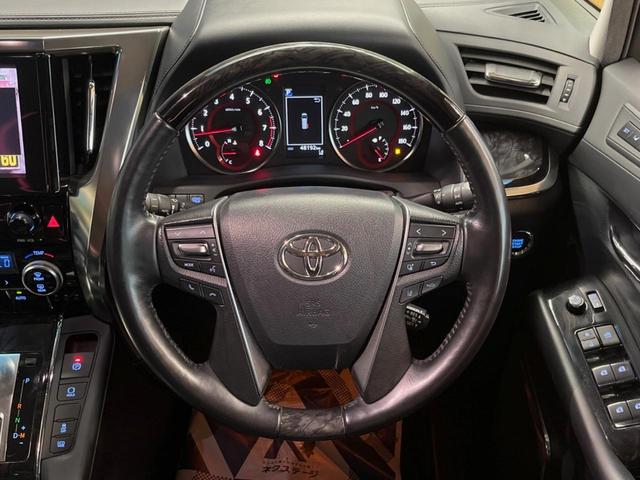 アルファード 2.5S Cパッケージ 禁煙車 純正9型ディスプレイオーディオ バックカメラ 12.8型フリップダウンモニター レーダークルーズコントロール シートベンチレーション 純正ウッドコンビステアリング 純正18インチアルミ(12枚目)