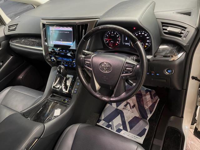 アルファード 2.5S Cパッケージ 禁煙車 純正9型ディスプレイオーディオ バックカメラ 12.8型フリップダウンモニター レーダークルーズコントロール シートベンチレーション 純正ウッドコンビステアリング 純正18インチアルミ(32枚目)