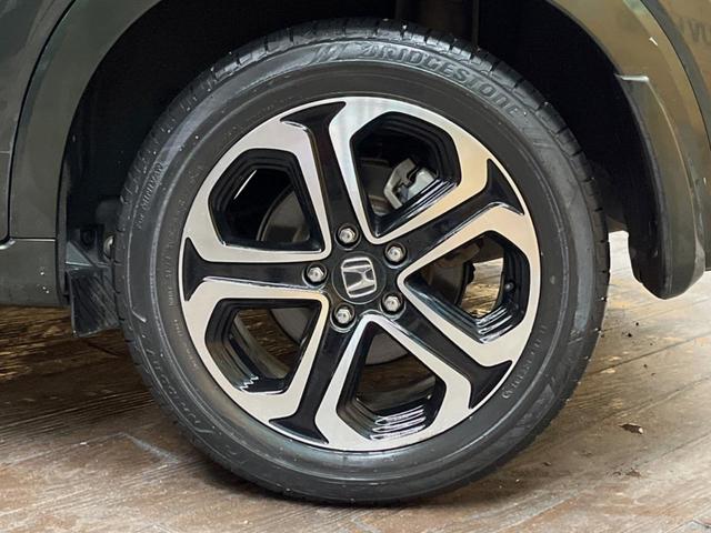 ヴェゼル ハイブリッドZ 純正ナビ バックカメラ クルーズコントロール シートヒーター 横滑り防止機能 スマートキー 純正革巻きステアリング 純正17インチアルミホイール 電動パーキング 左右独立オートエアコン(13枚目)