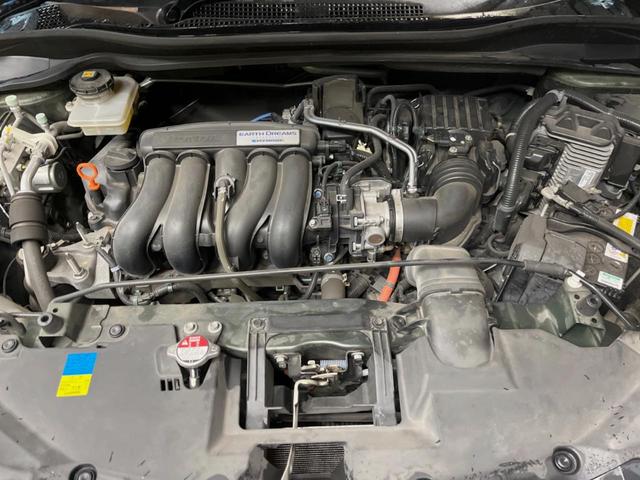 ヴェゼル ハイブリッドZ 純正ナビ バックカメラ クルーズコントロール シートヒーター 横滑り防止機能 スマートキー 純正革巻きステアリング 純正17インチアルミホイール 電動パーキング 左右独立オートエアコン(19枚目)