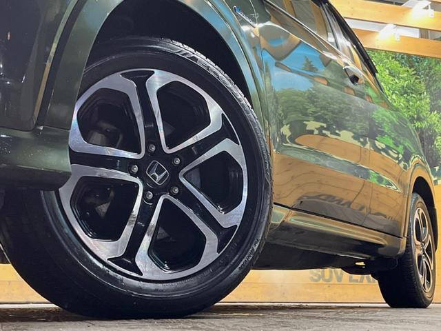 ヴェゼル ハイブリッドZ 純正ナビ バックカメラ クルーズコントロール シートヒーター 横滑り防止機能 スマートキー 純正革巻きステアリング 純正17インチアルミホイール 電動パーキング 左右独立オートエアコン(26枚目)