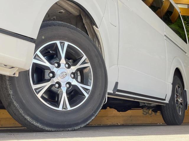 ハイエースバン スーパーGL ダークプライムII ディーゼル 4WD 10インチナビ 全周囲カメラ トヨタセーフティセンス 禁煙車 純正15インチオプションアルミ デジタルインナーミラー ビルトインETC オートハイビーム 純正15インチアルミ(13枚目)