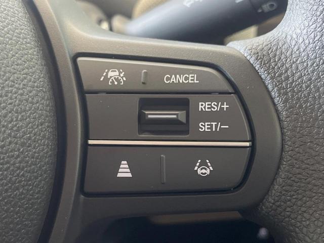 フリード エアー 登録済未使用車 純正ディスプレイオーディオ バックカメラ レーダークルーズ ホンダセンシング 両側電動スライド 車線逸脱警報 クリアランスソナー スマートキー チップアップシート LEDヘッド(6枚目)