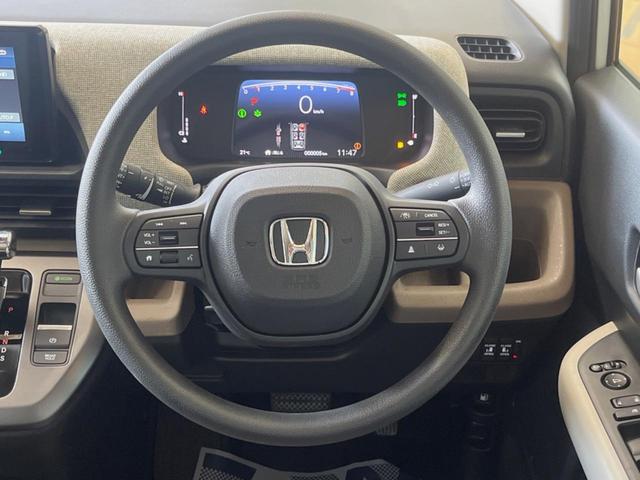 フリード エアー 登録済未使用車 純正ディスプレイオーディオ バックカメラ レーダークルーズ ホンダセンシング 両側電動スライド 車線逸脱警報 クリアランスソナー スマートキー チップアップシート LEDヘッド(11枚目)