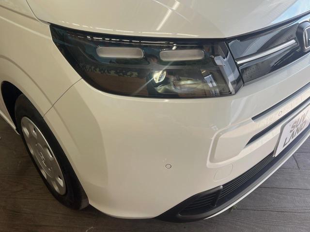 フリード エアー 登録済未使用車 純正ディスプレイオーディオ バックカメラ レーダークルーズ ホンダセンシング 両側電動スライド 車線逸脱警報 クリアランスソナー スマートキー チップアップシート LEDヘッド(12枚目)