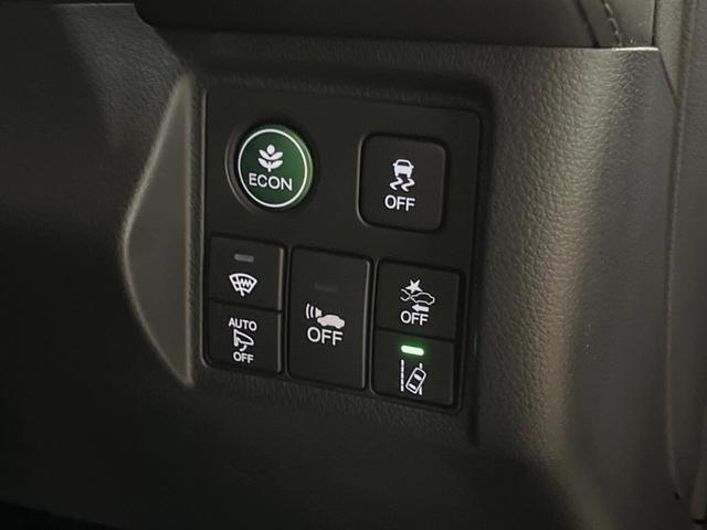 ヴェゼル ハイブリッドＺ・ホンダセンシング　禁煙車　純正ＳＤナビ　バックカメラ　ホンダセンシング　レーダークルーズコントロール　シートヒーター　ハーフレザーシート　トノボード　純正革巻きステアリング　１７インチ純正アルミ　デュアルオートエアコン（5枚目）