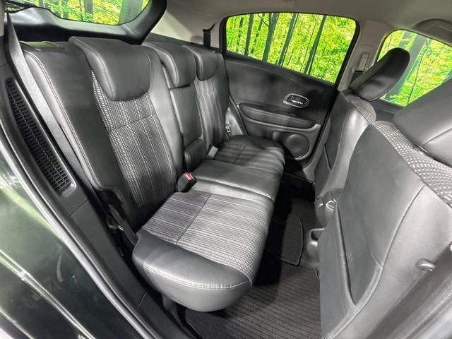 ヴェゼル ハイブリッドＺ・ホンダセンシング　禁煙車　純正ＳＤナビ　バックカメラ　ホンダセンシング　レーダークルーズコントロール　シートヒーター　ハーフレザーシート　トノボード　純正革巻きステアリング　１７インチ純正アルミ　デュアルオートエアコン（10枚目）