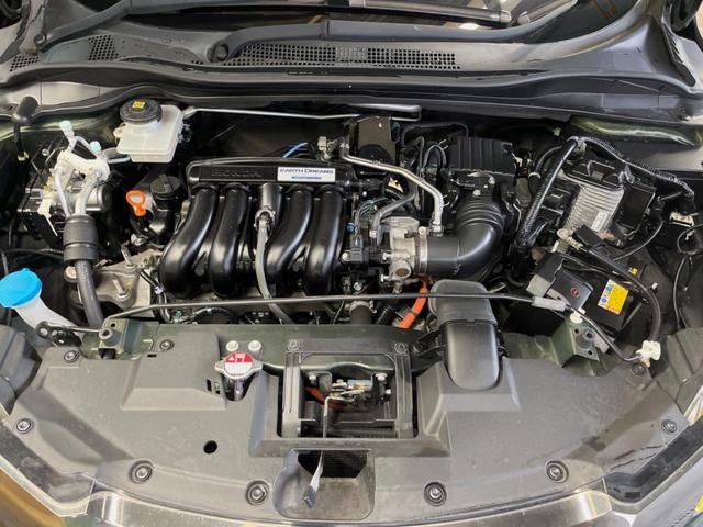 ヴェゼル ハイブリッドＺ・ホンダセンシング　禁煙車　純正ＳＤナビ　バックカメラ　ホンダセンシング　レーダークルーズコントロール　シートヒーター　ハーフレザーシート　トノボード　純正革巻きステアリング　１７インチ純正アルミ　デュアルオートエアコン（19枚目）