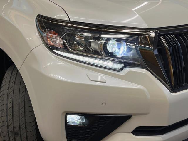 ランドクルーザープラド TX Lパッケージ・ブラックエディション ディーゼル 禁煙車 ムーンルーフ 9インチナビ バックカメラ セーフティーセンス デジタルインナーミラー パワーシート ブラック革シート 18インチ純正ブラック塗装アルミ シートベンチレーション(14枚目)