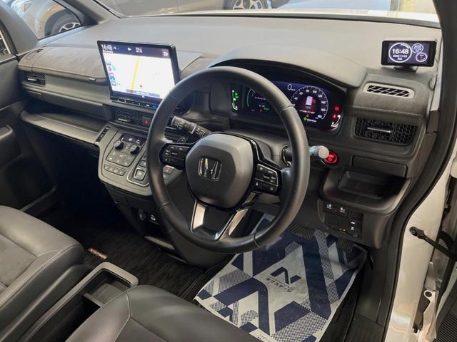 ステップワゴン ｅ：ＨＥＶスパーダ　プレミアムライン　禁煙車　１１．４インチナビ　全周囲カメラ　パワーバックドア　ホンダセンシング　ハーフレザーシート　両側電動スライドドア　シートヒーター　デュアルオートエアコン　オートブレーキホールド　１７インチアルミ（30枚目）