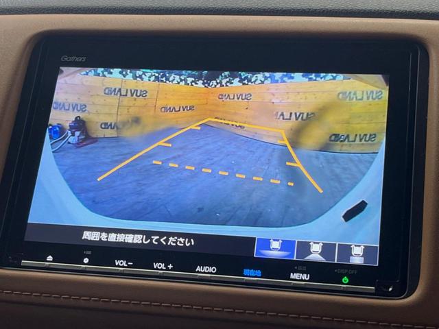 ヴェゼル ハイブリッドＺ・ホンダセンシング　禁煙車　純正ＳＤナビ　バックカメラ　レーダークルーズコントロール　ホンダセンシング　シートヒーター　ＥＴＣ　１７インチ純正アルミ　左右独立オートエアコン　ブラウン革ファブリックコンビシート　トノカバー（4枚目）