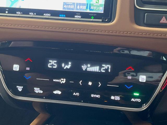 ヴェゼル ハイブリッドＺ・ホンダセンシング　禁煙車　純正ＳＤナビ　バックカメラ　レーダークルーズコントロール　ホンダセンシング　シートヒーター　ＥＴＣ　１７インチ純正アルミ　左右独立オートエアコン　ブラウン革ファブリックコンビシート　トノカバー（8枚目）