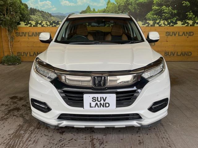 ヴェゼル ハイブリッドＺ・ホンダセンシング　禁煙車　純正ＳＤナビ　バックカメラ　レーダークルーズコントロール　ホンダセンシング　シートヒーター　ＥＴＣ　１７インチ純正アルミ　左右独立オートエアコン　ブラウン革ファブリックコンビシート　トノカバー（15枚目）