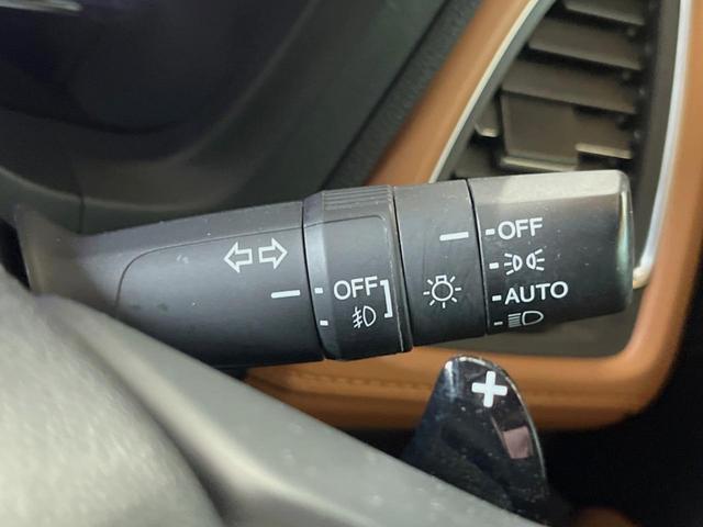 ヴェゼル ハイブリッドＺ・ホンダセンシング　禁煙車　純正ＳＤナビ　バックカメラ　レーダークルーズコントロール　ホンダセンシング　シートヒーター　ＥＴＣ　１７インチ純正アルミ　左右独立オートエアコン　ブラウン革ファブリックコンビシート　トノカバー（26枚目）