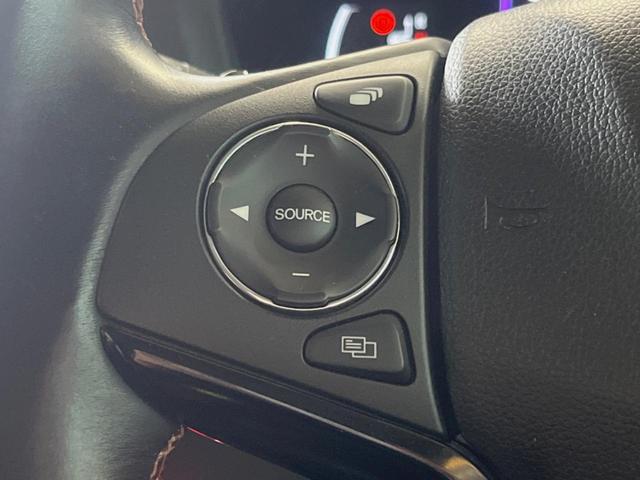 ヴェゼル ハイブリッドＺ・ホンダセンシング　禁煙車　純正ＳＤナビ　バックカメラ　レーダークルーズコントロール　ホンダセンシング　シートヒーター　ＥＴＣ　１７インチ純正アルミ　左右独立オートエアコン　ブラウン革ファブリックコンビシート　トノカバー（27枚目）