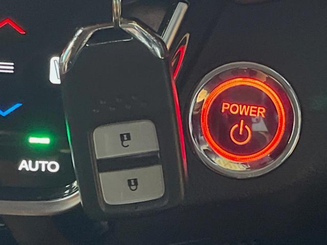 ヴェゼル ハイブリッドＺ・ホンダセンシング　禁煙車　純正ＳＤナビ　バックカメラ　レーダークルーズコントロール　ホンダセンシング　シートヒーター　ＥＴＣ　１７インチ純正アルミ　左右独立オートエアコン　ブラウン革ファブリックコンビシート　トノカバー（30枚目）