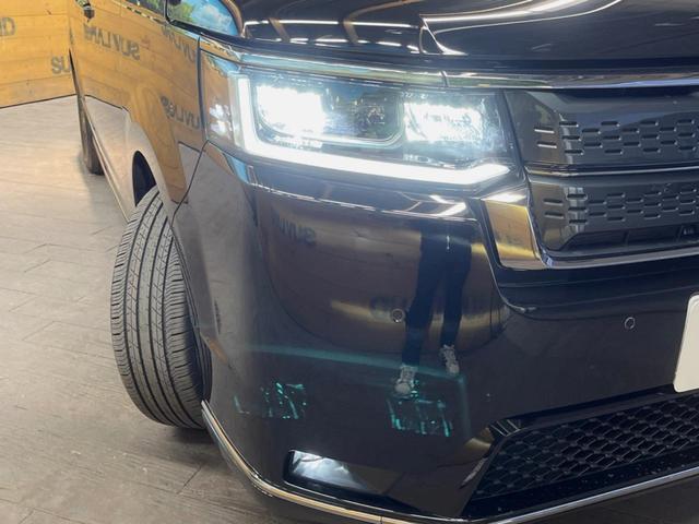 ステップワゴン ｅ：ＨＥＶスパーダ　登録済未使用車　ホンダセンシング　レーダークルーズ　両側パワスラ　ブラインドスポットモニター　パワーバックドア　シーケンシャルターンランプ　ハーフレザーシート　シートヒーター　純正１６インチアルミ（12枚目）