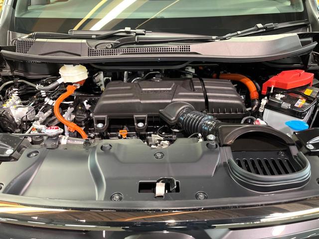 ステップワゴン ｅ：ＨＥＶスパーダ　登録済未使用車　ホンダセンシング　レーダークルーズ　両側パワスラ　ブラインドスポットモニター　パワーバックドア　シーケンシャルターンランプ　ハーフレザーシート　シートヒーター　純正１６インチアルミ（18枚目）