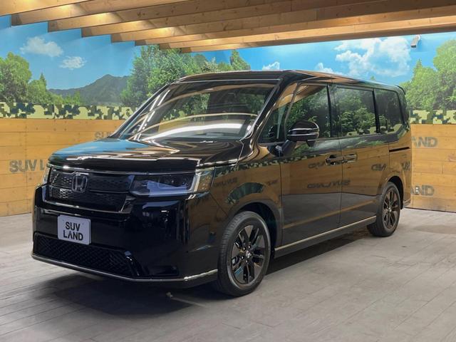 ステップワゴン ｅ：ＨＥＶスパーダ　登録済未使用車　ホンダセンシング　レーダークルーズ　両側パワスラ　ブラインドスポットモニター　パワーバックドア　シーケンシャルターンランプ　ハーフレザーシート　シートヒーター　純正１６インチアルミ（46枚目）