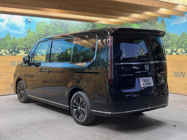 ステップワゴン ｅ：ＨＥＶスパーダ　登録済未使用車　ホンダセンシング　レーダークルーズ　両側パワスラ　ブラインドスポットモニター　パワーバックドア　シーケンシャルターンランプ　ハーフレザーシート　シートヒーター　純正１６インチアルミ（50枚目）