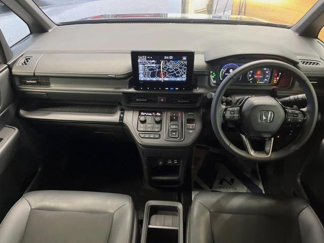 ステップワゴン e:HEVスパーダ 純正9型ナビ バックカメラ フリップダウンモニター レーダークルーズ 禁煙車 両側電動スライドドア ブラインドスポットモニター シートヒーター パワーバックドア ETC LEDヘッド オットマン(2枚目)