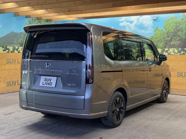 ステップワゴン e:HEVスパーダ 純正9型ナビ バックカメラ フリップダウンモニター レーダークルーズ 禁煙車 両側電動スライドドア ブラインドスポットモニター シートヒーター パワーバックドア ETC LEDヘッド オットマン(19枚目)