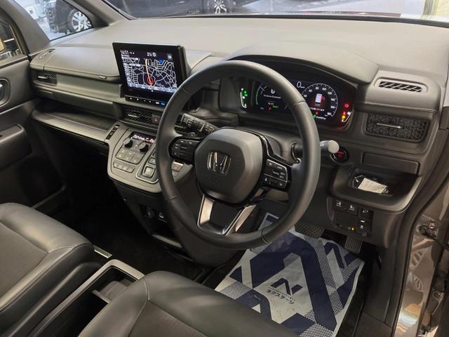 ステップワゴン e:HEVスパーダ 純正9型ナビ バックカメラ フリップダウンモニター レーダークルーズ 禁煙車 両側電動スライドドア ブラインドスポットモニター シートヒーター パワーバックドア ETC LEDヘッド オットマン(33枚目)