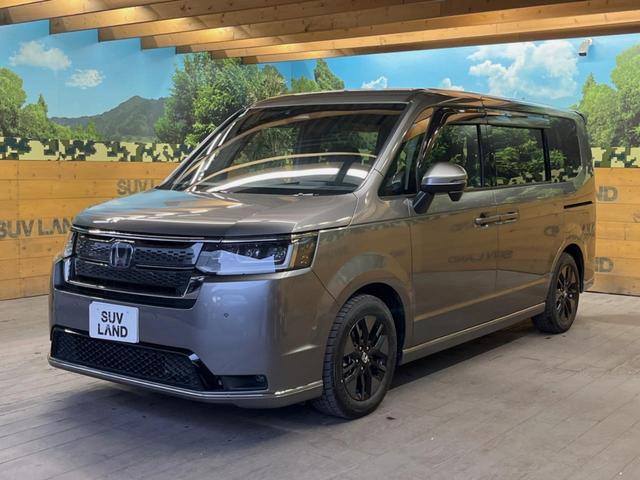 ステップワゴン e:HEVスパーダ 純正9型ナビ バックカメラ フリップダウンモニター レーダークルーズ 禁煙車 両側電動スライドドア ブラインドスポットモニター シートヒーター パワーバックドア ETC LEDヘッド オットマン(49枚目)