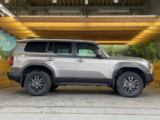 ランドクルーザー２５０ ＶＸ　１２．３インチディスプレイオーディオ　ブラインドスポットモニター　全周囲カメラ　サンルーフ　黒革シート　純正１８インチアルミ　パワーバックドア　レーダークルーズ　デジタルインナーミラー　シートヒーター（54枚目）