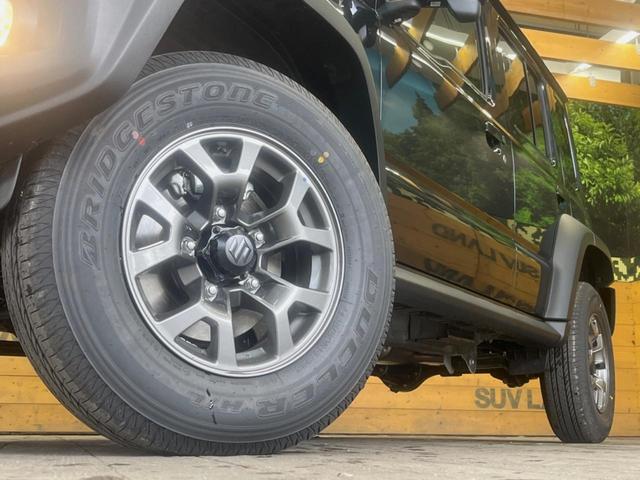 ジムニーノマド ＦＣ　４ＷＤ　スズキセーフティサポート　レーダークルーズ　前席シートヒーター　ダウンヒルアシスト　オートハイビーム　ＬＥＤヘッド　コーナーセンサー　純正１５インチアルミ　革巻きステアリング　オートエアコン（13枚目）