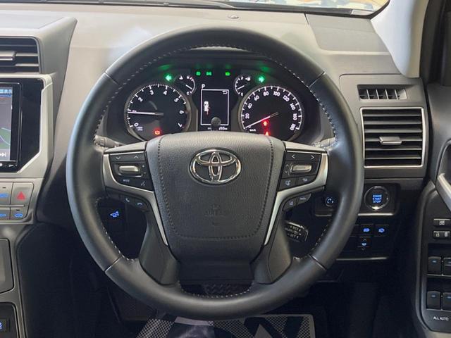 ランドクルーザープラド ＴＸ　Ｌパッケージ　マットブラックエディション　サンルーフ　ＢＩＧ－Ｘ９型ナビ　バックカメラ　セーフティセンス　レーダークルーズ　黒革シート　シートベンチレーション　グレード専用１８インチアルミ　革巻きステアリング　スマートキー　ＬＥＤヘッド（11枚目）