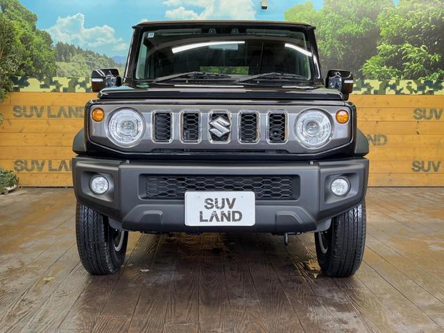 ジムニーノマド ＦＣ　登録済未使用車　４ＷＤ　４ＡＴ　スズキセーフティーサポート　シートヒーター　純正革巻きステアリング　１５インチ純正アルミ　ＬＥＤヘッド　ヘッドライトウォッシャー　衝突軽減装備　車線逸脱警告装備（12枚目）