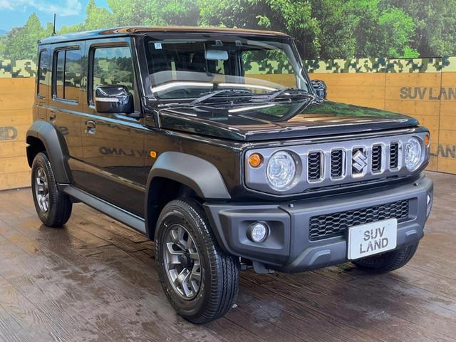 ジムニーノマド ＦＣ　登録済未使用車　４ＷＤ　４ＡＴ　スズキセーフティーサポート　シートヒーター　純正革巻きステアリング　１５インチ純正アルミ　ＬＥＤヘッド　ヘッドライトウォッシャー　衝突軽減装備　車線逸脱警告装備（14枚目）