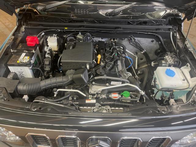 ジムニーノマド ＦＣ　登録済未使用車　４ＷＤ　４ＡＴ　スズキセーフティーサポート　シートヒーター　純正革巻きステアリング　１５インチ純正アルミ　ＬＥＤヘッド　ヘッドライトウォッシャー　衝突軽減装備　車線逸脱警告装備（16枚目）