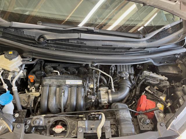 フリードハイブリッド ハイブリッド・モデューロX ホンダセンシング 純正ナビ バックカメラ ホンダセンシング レーダークルーズ 両側パワスラ ハーフレザーシート LEDヘッド 純正15インチアルミ オートエアコン オートライト 純正革巻きステアリング スマートキー(18枚目)