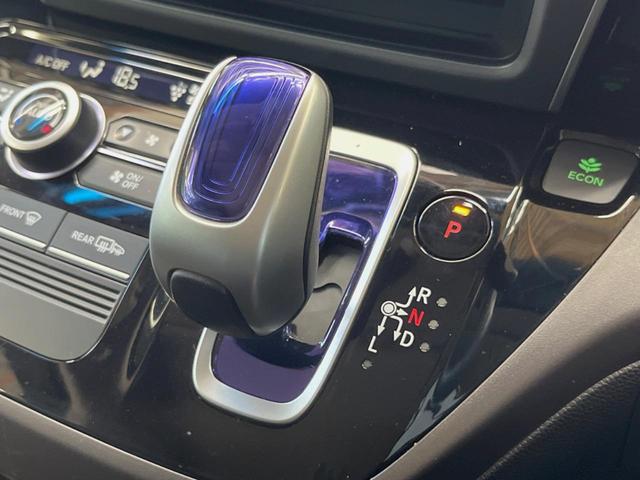 フリードハイブリッド ハイブリッド・モデューロX ホンダセンシング 純正ナビ バックカメラ ホンダセンシング レーダークルーズ 両側パワスラ ハーフレザーシート LEDヘッド 純正15インチアルミ オートエアコン オートライト 純正革巻きステアリング スマートキー(34枚目)