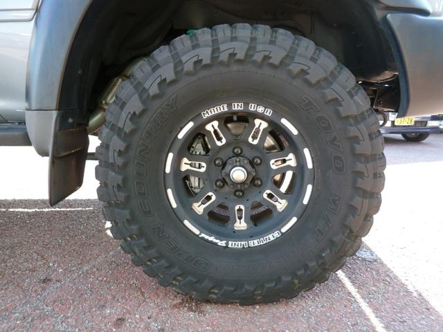 ランドクルーザー８０ ＶＸリミテッド　ターボ・リアＬＳＤ・リフトＵＰ・純正角目４灯・前後ラテラル・マフラー・１６ＡＷ・オープンカントリーＭＴ・ヒッチ・ＳＤナビＴＶ・Ｂカメラ・ＥＴＣ・リーディングダウン・ＬＥＤテール・前後ドラレコ・モモステ（34枚目）