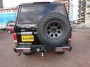ＺＸ　後期型・リアＬＳＤ・リフトＵＰ公認・ミッキ－トンプソン１６ＡＷ・スタンダードグリル新品・ジオランダーＧ００３新品５本・外ステアリング・専用シートカバー・ヒッチ・プロコンプショック新品・純正バイザー（21枚目）