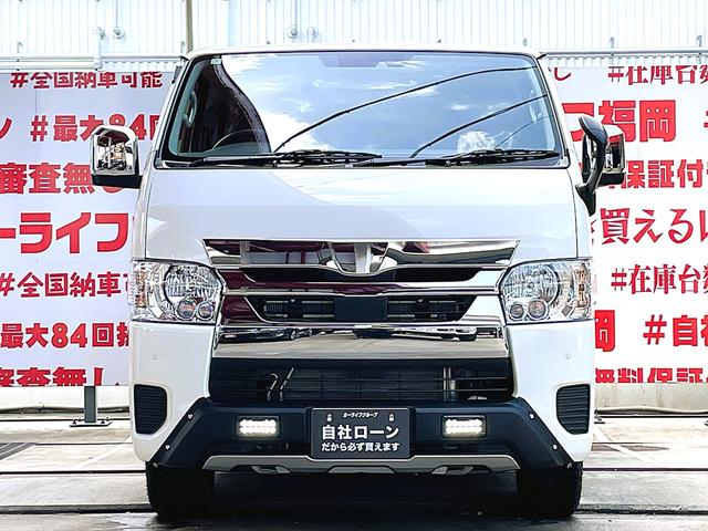 ハイエースバン ロングＤＸ　ＧＬパッケージ　ＦＵ１３４２　ＧＲ仕様車　新車コンプリート　ディーラーオプション　メッキドアミラー　ＴＲＤフロントスポイラー　リアスポイラー　サイドスカート　マッドクロス１６インチＡＷ　ホワイトレターＲＴタイヤ（6枚目）