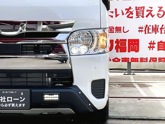 ハイエースバン ロングＤＸ　ＧＬパッケージ　ＦＵ１３４２　ＧＲ仕様車　新車コンプリート　ディーラーオプション　メッキドアミラー　ＴＲＤフロントスポイラー　リアスポイラー　サイドスカート　マッドクロス１６インチＡＷ　ホワイトレターＲＴタイヤ（7枚目）