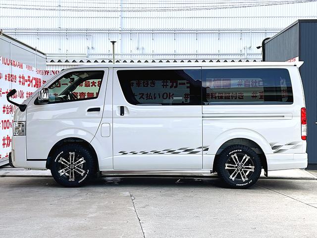 ハイエースバン ロングＤＸ　ＧＬパッケージ　ＦＵ１３４２　ＧＲ仕様車　新車コンプリート　ディーラーオプション　メッキドアミラー　ＴＲＤフロントスポイラー　リアスポイラー　サイドスカート　マッドクロス１６インチＡＷ　ホワイトレターＲＴタイヤ（12枚目）