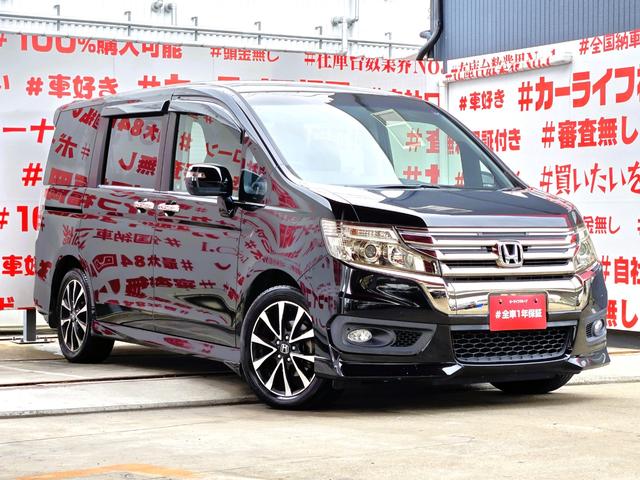 ステップワゴンスパーダ Ｚ　クールスピリット　ＦＵ１９６９　純正インターナビ　ＣＤ　ＤＶＤ　ＭＳＶ　地デジフルセグ　バックカメラ　ビルトインＥＴＣ　革巻ハンドル　ステアリングスイッチ　クルーズコントロール　パドルシフト　オートライト（3枚目）