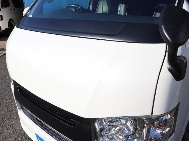 レジアスエースバン スーパーGL ダークプライム ディーゼルターボ ギブソンエアロ バッドフェイスボンネット マットブラック塗装 CRSホイール オーバーフェンダー ヴァレンティドアミラーウインカー LEDテールランプ シートカバー 7インチナビ(12枚目)