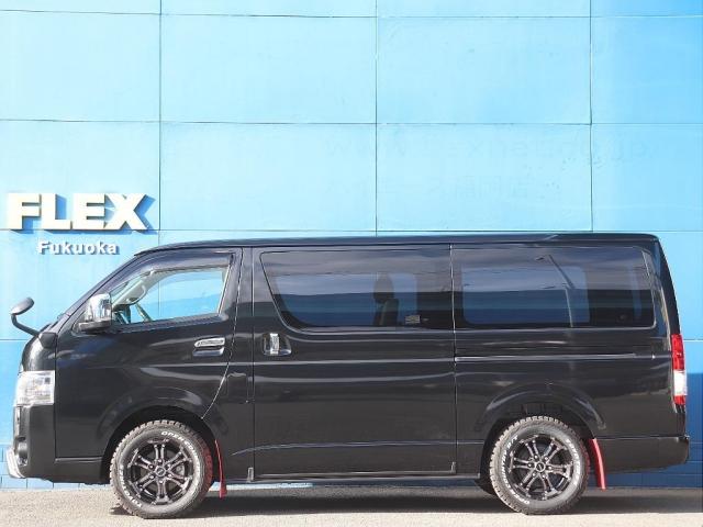 ハイエースバン スーパーGL ダークプライムII両側自動ドア寒冷地仕様パワースライドドアパノラミックビューモニターデジタルインナーミラーTRDマットガードTSS社外ナビTRDマットフラップ赤フォグランプ黄色LED(5枚目)