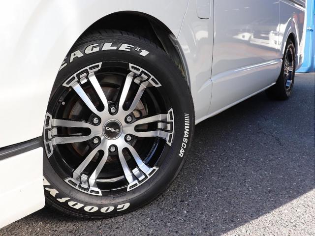 ハイエースバン スーパーＧＬ　ダークプライム　純正７型ＳＤナビ６７　ＤＥＬＦ０２　１７ＡＷ　１．５インチダウン　ＳＲＳエアバッグ　走行「４２千キロ！　ＥＴＣバックカメラ　ＬＥＤヘッドライト４型Ｄ　ダークプライム　黒木目マホガニー調インテリアパネル（3枚目）
