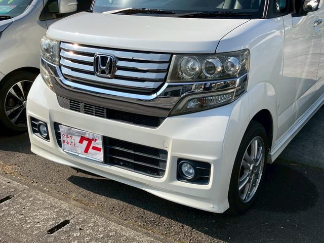 Ｎ－ＢＯＸカスタム Ｇ・Ｌパッケージ　メモリーナビ　ＴＶ　バックモニター　パワースライドドア　スマートキー　プッシュスタート　革調シートカバー　ＨＩＤヘッドライト　フォグランプ　セキュリティアラーム　プライバシーガラス　ウインカーミラー（5枚目）