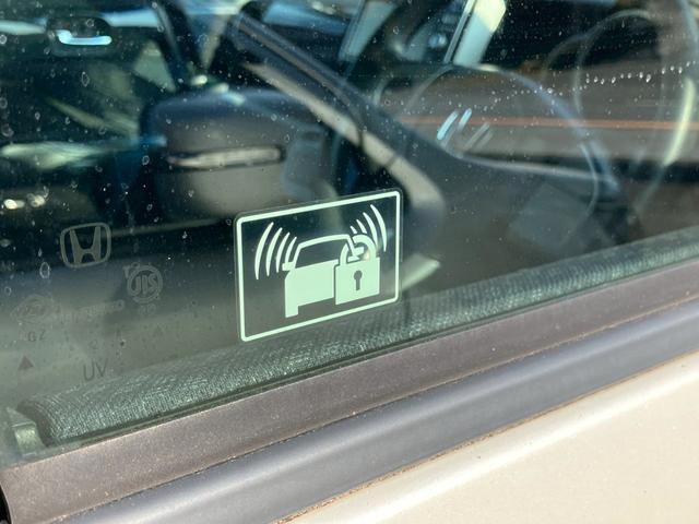 Ｎ－ＢＯＸカスタム Ｇ・Ｌパッケージ　メモリーナビ　ＴＶ　バックモニター　パワースライドドア　スマートキー　プッシュスタート　革調シートカバー　ＨＩＤヘッドライト　フォグランプ　セキュリティアラーム　プライバシーガラス　ウインカーミラー（17枚目）