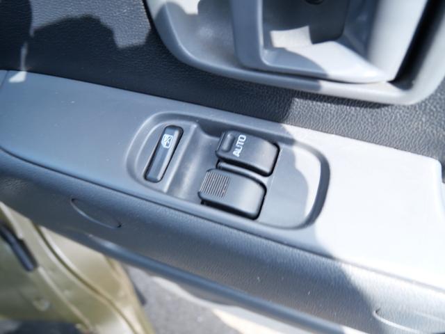 ハイゼットカーゴ デラックスリミテッド　セレクト４ＷＤ　エアコン　パワーステアリング　パワーウィンドウ　Ｗエアバッグ　ラジオ　社外１２インチアルミホイール　ルーフラック（22枚目）